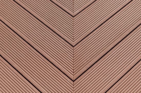 Panel building material with ridges and a chevron pattern. Hemp fibers combined with bio-based resins can be manufactured in a wide range of products.